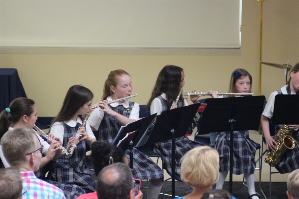 Students playing band instruments